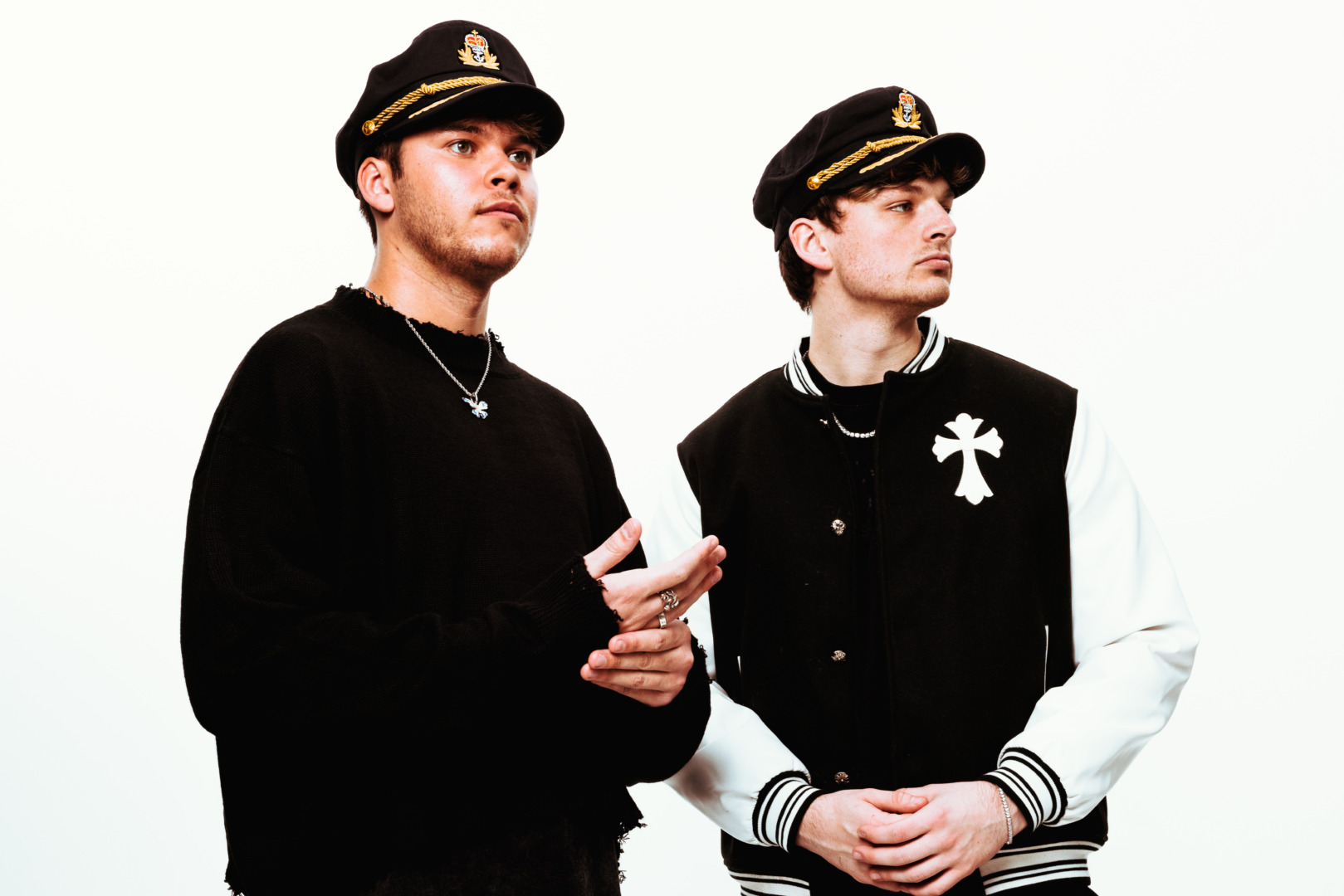 Ship Wrek posing on a white background with a capitains hat on