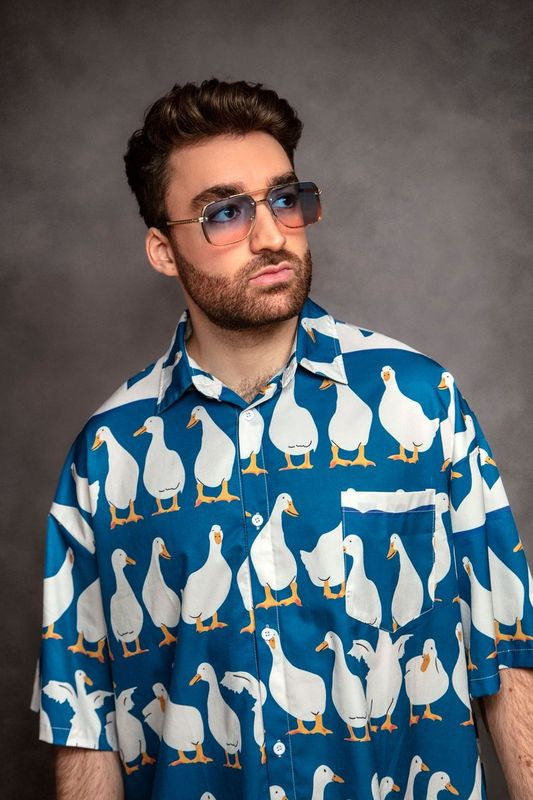 colorful duck shirt portrait of oliver heldens