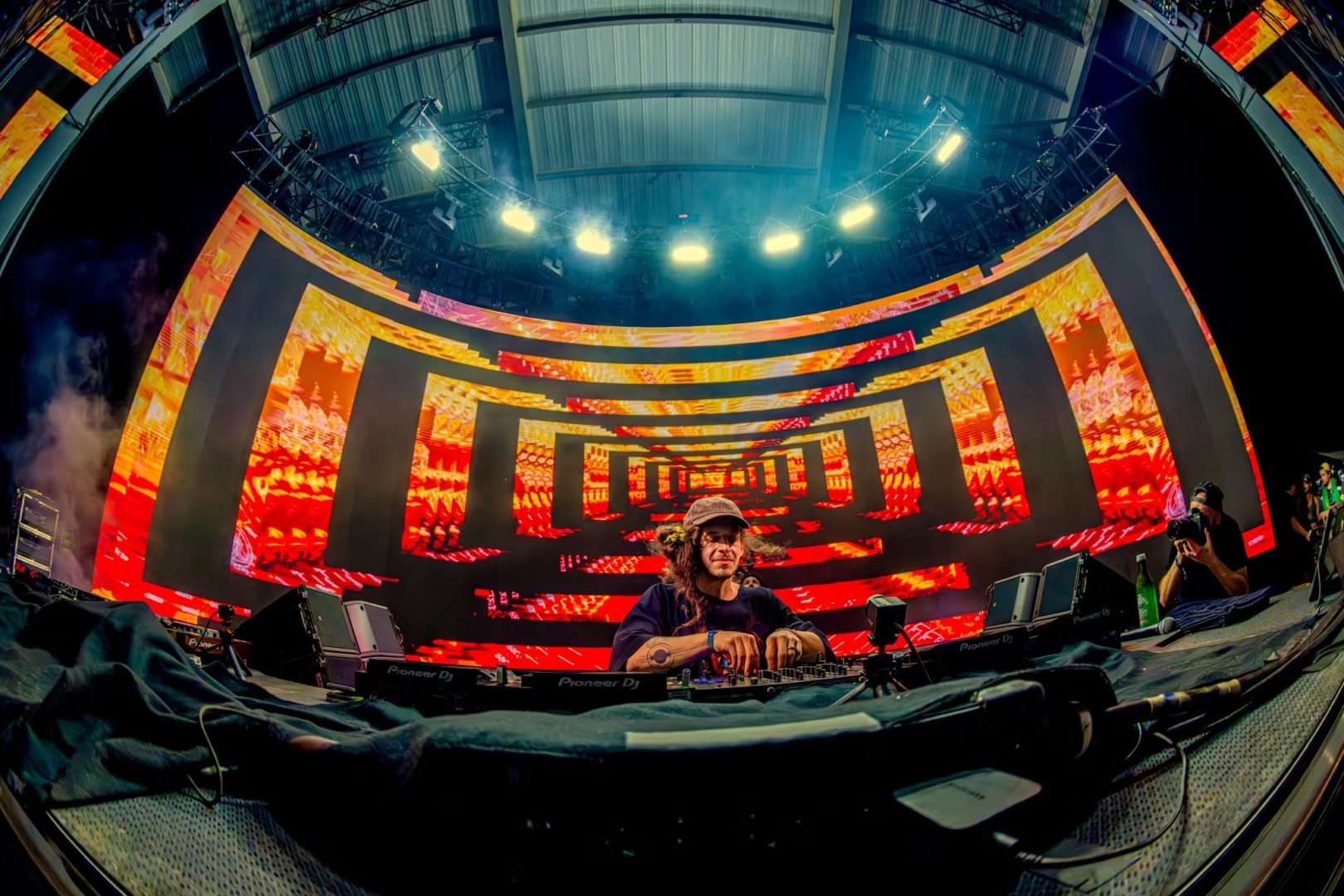 Subtronics beneath a trippy background