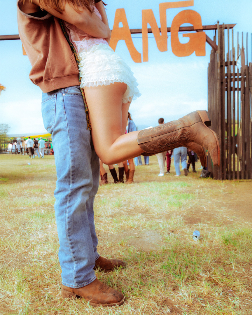 Cowgirl/cowboy boots on festival attendees