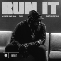 A black hooded man leaning down on a couch with the title run it above him