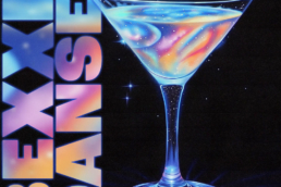 a glaxy looking martini glass upon a black background