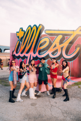 fans standing in front of the ILLfest sign