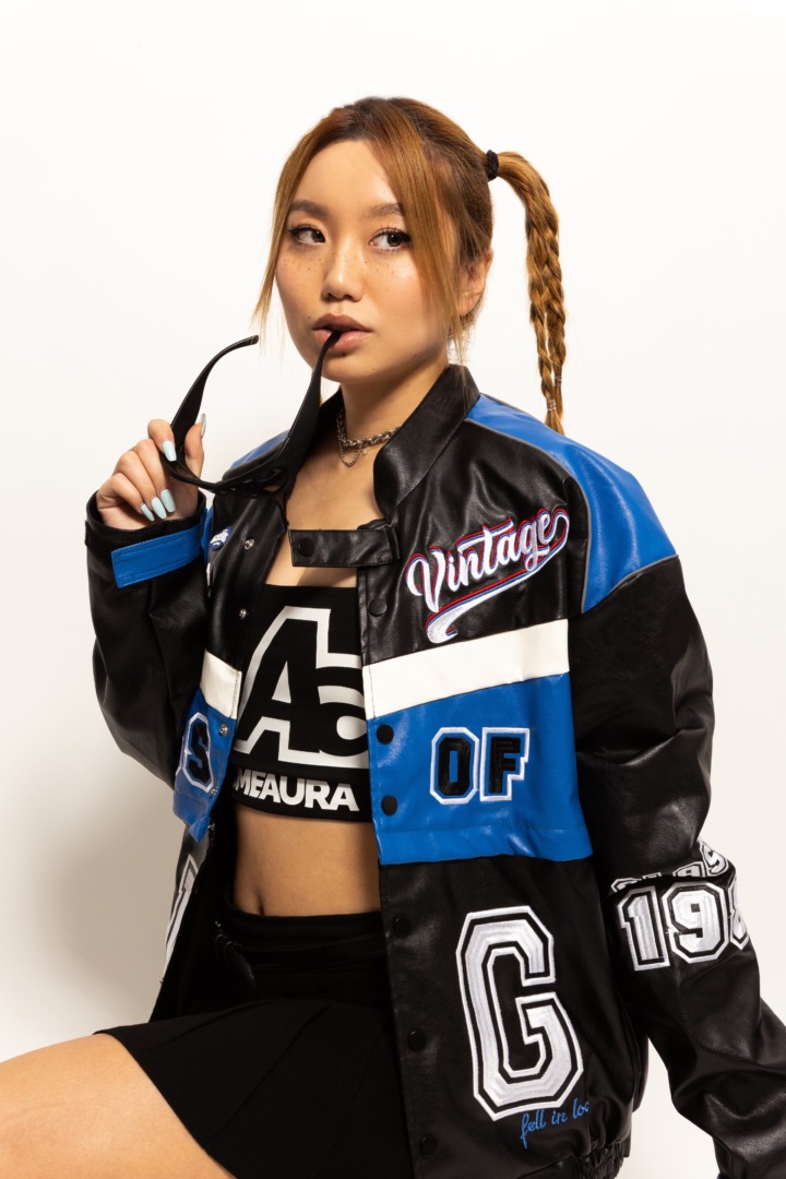 CHYL posing wearing race gear type clothes